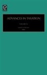 Porcano, Thomas M. Porcano, Thomas M. Porcano - Advances in Taxation