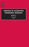 Vicky Arnold, Vicky Arnold - Advances in Accounting Behavioral Research