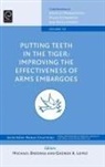 Michael Brzoska, Michael Bzoska, George a Lopez, George A. Lopez, Michael Brzoska, Michael Professor Bzoska - Putting Teeth in the Tiger