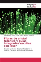 Vícto Berdejo Arceiz, Víctor Berdejo Arceiz, M Rebolledo, Miguel A. Rebolledo, Juan Vallés, Juan A Vallés... - Fibras de cristal fotónico y guías integradas escritas con láser