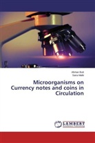 Afsha Butt, Afshan Butt, Saira Malik - Microorganisms on Currency notes and coins in Circulation