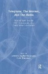 Jeffrey K. Mackie-Mason, MacKie-Mason Jeffrey K., David Waterman, Waterman David - Telephony, the Internet, and the Media