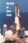 Commission on Engineering and Technical, Commission on Engineering and Technical Systems, Committee on Space Shuttle Upgrades, Division on Engineering and Physical Sci, Division on Engineering and Physical Sciences, National Academy Of Sciences... - Upgrading the Space Shuttle