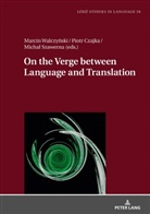 Lukasz Bogucki, Piotr Czajka, Micha¿ Szawerna, Michal Szawerna, Marcin Walczynski - On the Verge Between Language and Translation