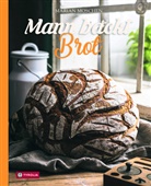 Marian Moschen - Mann backt Brot