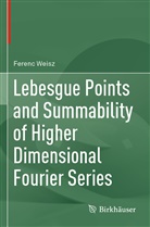 Ferenc Weisz - Lebesgue Points and Summability of Higher Dimensional Fourier Series
