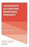 Dr. Khondkar E. (University of Massachusetts Karim, Khondkar E. Karim - Advances in Accounting Behavioral Research
