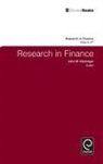 John F. Kensinger, John W. Kensinger - Research in Finance