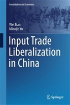 Wei Tian, Miaojie Yu - Input Trade Liberalization in China