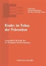 Claudia Heinzelmann, Erich Marks, Gina Rosa Wollinger - Kinder im Fokus der Prävention