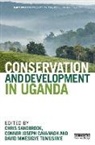 Chris (Unep Sandbrook, Connor Joseph Cavanagh, Chris Sandbrook, Sandbrook Chris, David Mwesigye Tumusiime - Conservation and Development in Uganda