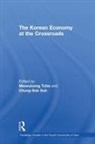 Chung-Sok Suh, Chung-Sok Tcha Suh, Moon Joong Tcha - Korean Economy At the Crossroads
