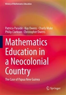 Philip Clarkson, Charly Muke, Charly et al Muke, Christopher Owens, Kay Owens, Patricia Paraide - Mathematics Education in a Neocolonial Country: The Case of Papua New Guinea