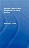 Kanhaya Gupta, Kanhaya (University of Alberta Gupta, Kanhaya L. Gupta, Gupta Kanhaya, L. Gupta Kanhaya, GUPTA KANHAYA L - Budget Deficits and Economic Activity in Asia