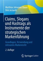 Matthias Johannes Bauer, Dirk Jestaedt - Claims, Slogans und Hashtags als Instrumente der strategischen Markenführung
