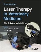 Christopher J. (Suffolk Veterinary Group Winkler, Christopher J. Miller Winkler, Lisa A. Miller, Christopher J. Winkler - Laser Therapy in Veterinary Medicine