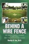 Martin D. Cox - Behind a Wire Fence