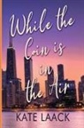 Kate Laack - While the Coin is in the Air