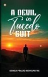 Durga Prasad Mohapatra - A Devil in Tuxedo Suit