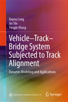 Xuyou Long, Jin Shi, Yingjie Wang - Vehicle-Track-Bridge System Subjected to Track Alignment
