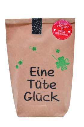 Wundertüte / Eine Tüte Glück mit Kleeblatt und Glücksbringer